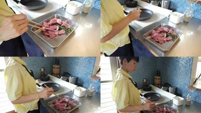 在IH烹饪加热器上烹饪猪肉的女人
