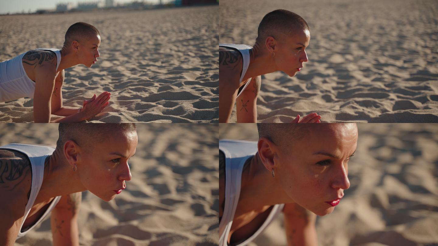 强壮的秃顶白种女人，在海滩上做木板运动