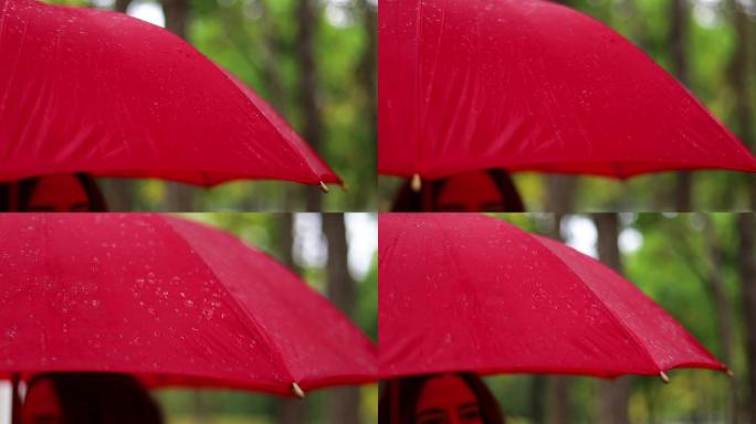 雨点雨伞红色雨伞浪漫向左走向右走