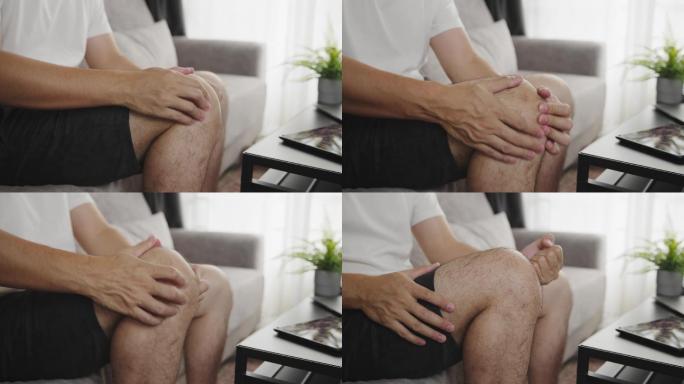 亚洲男子按摩膝盖疼痛和感觉不好。触发点医疗保健概念