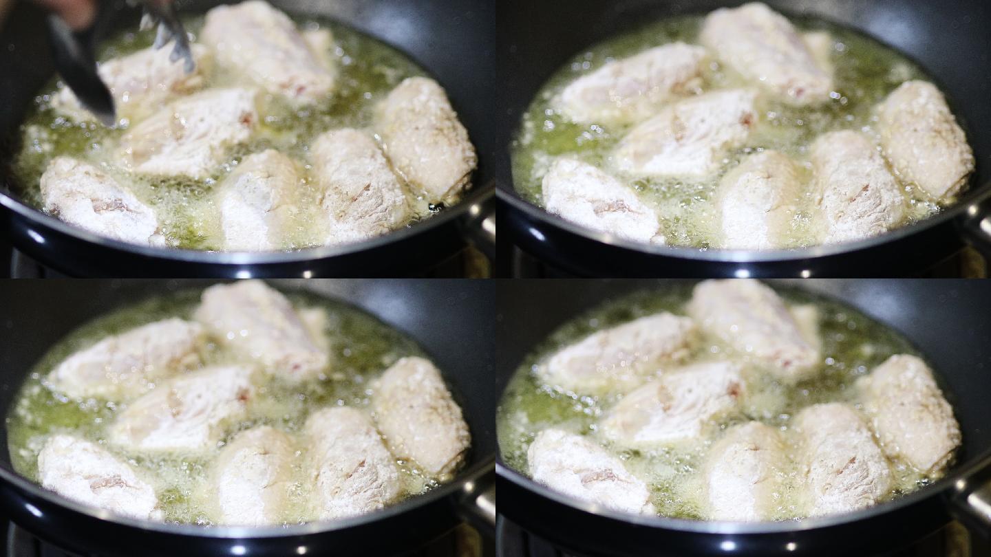 在家里用平底锅烹饪炸鸡的特写镜头