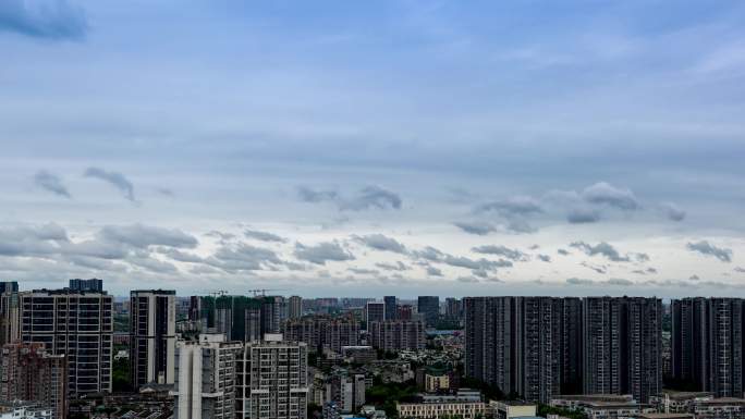 城市鸟瞰俯拍云朵流动高天上流云大气乌云