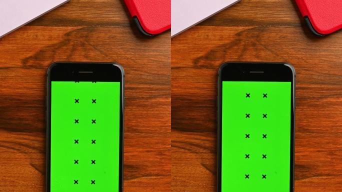 双手使用色度键绿色屏幕智能手机