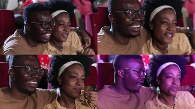 一对非裔美国夫妇看浪漫电影，在电影院里玩得很开心