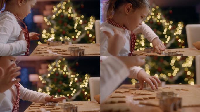 SLO MO可爱的小女孩在做圣诞饼干