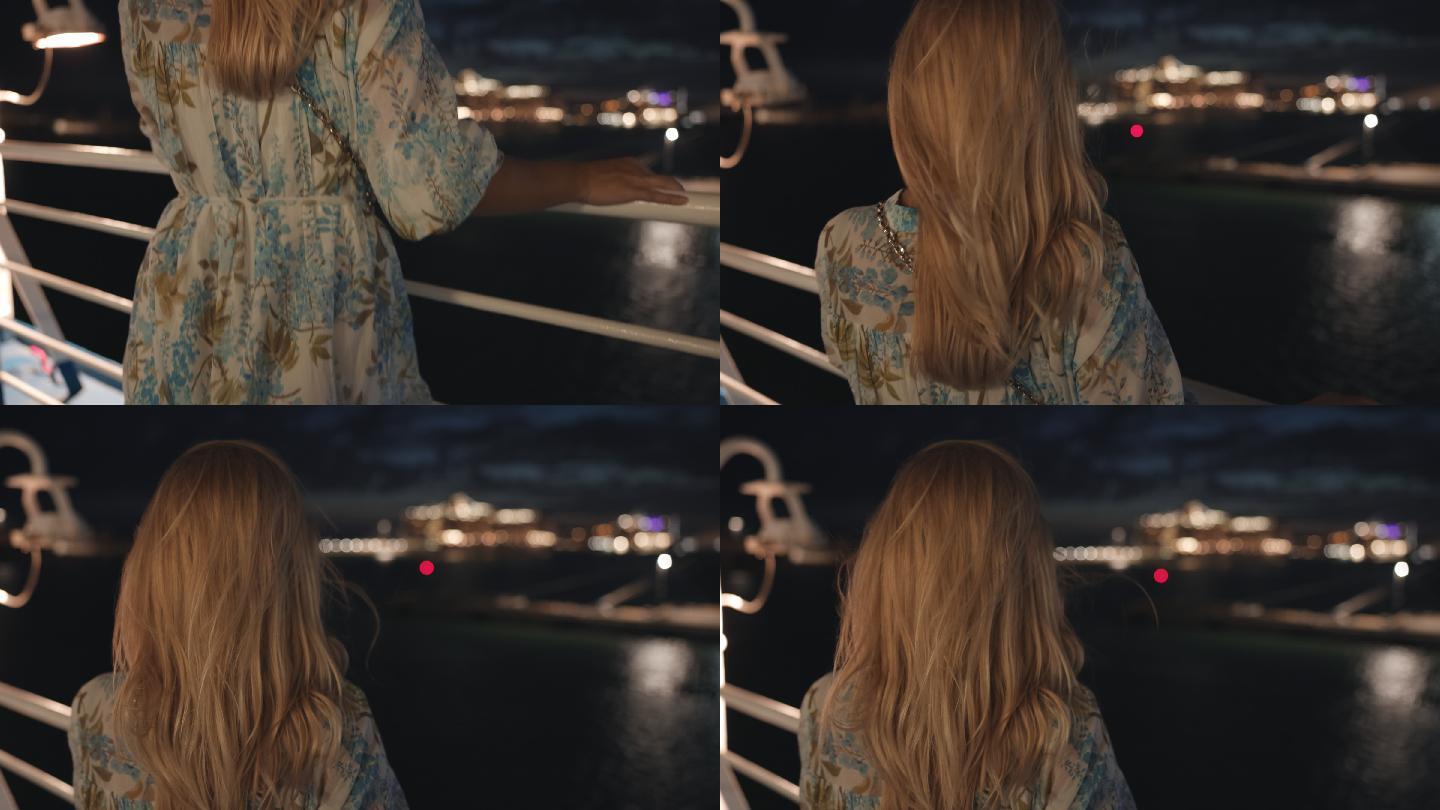 意大利撒丁岛，一个金发女孩看着大海的慢镜头。