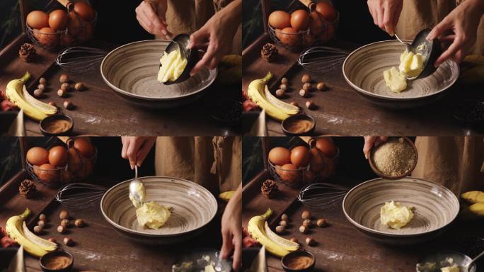 女性手在搅拌碗中加入黄油和榛子的特写镜头