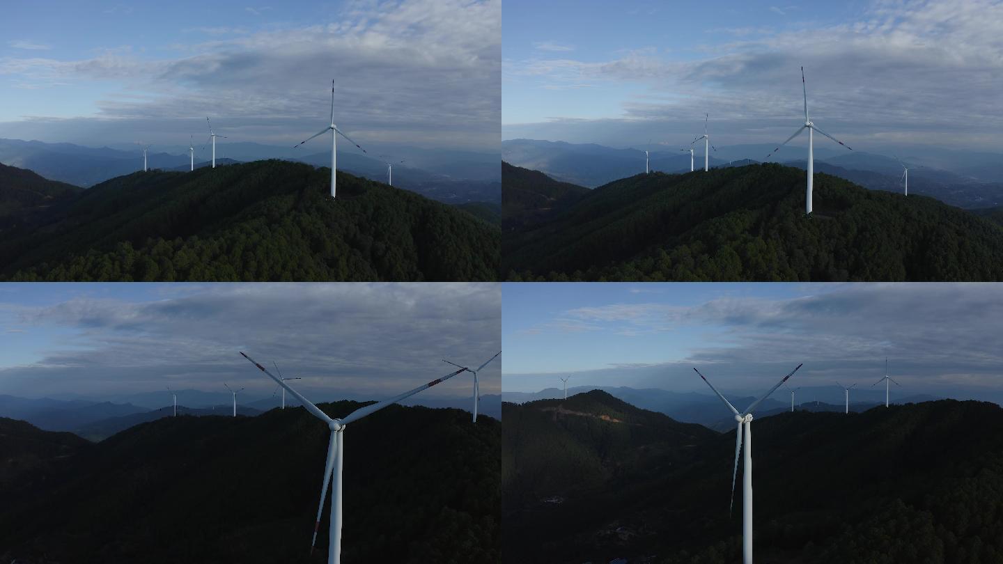 4K航拍蓝天白云下的风力发电机