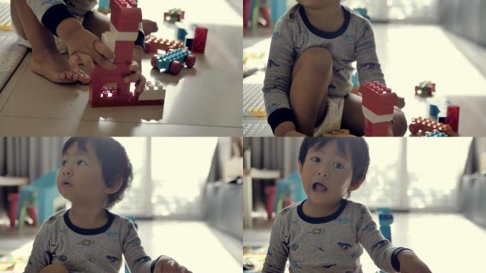 快乐男婴玩积木智力游戏宝宝聪明