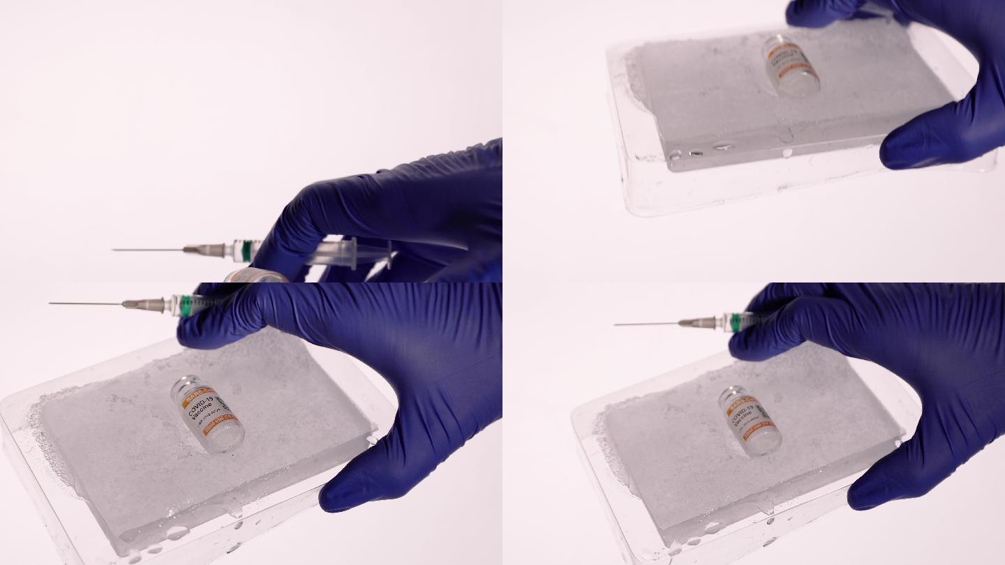 在特写镜头中，用外科手套手持一个深冻盒子，盒子内装有低温保存的2019冠状病毒疾病疫苗小瓶。标记SA