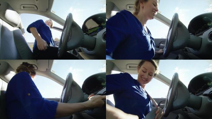 一位30多岁的快乐白人女性打开驾驶员侧车门，进入车内，将钥匙插入点火开关，扣上安全带，在阳光明媚的日