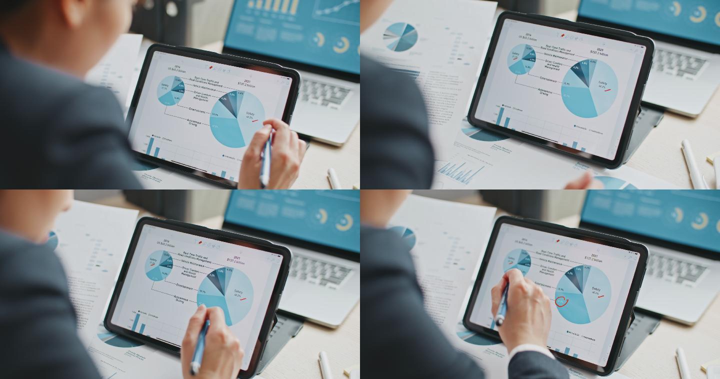 特写女商人使用数字平板电脑分析业务数据财务分析师在数字平板电脑上查看图表