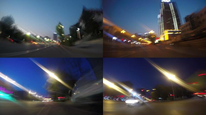 一段骑行视频，一条晚上的街道。