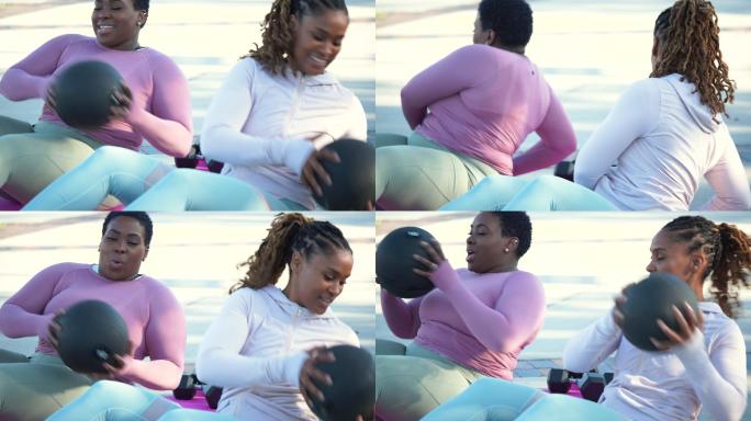 两名非裔美国女性用健身球锻炼