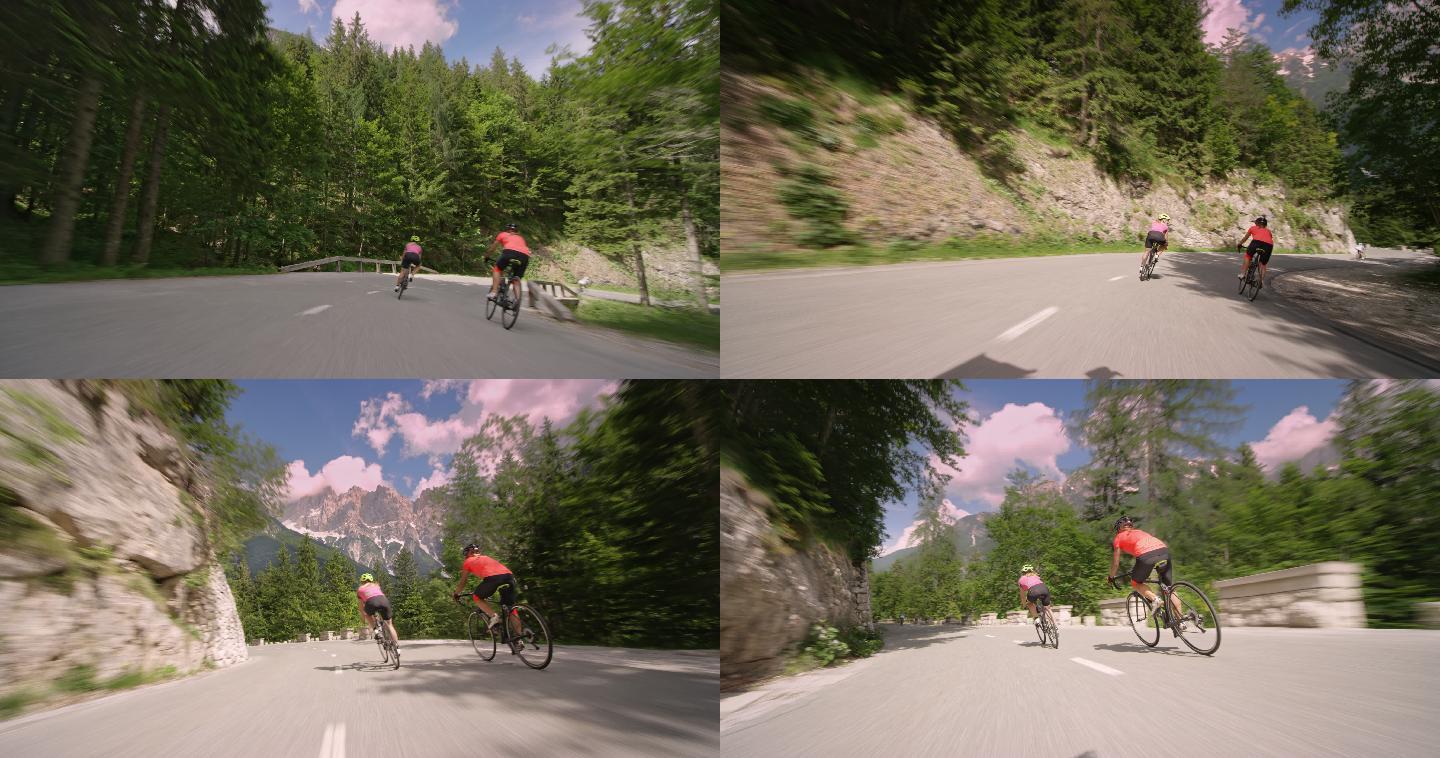 跟随两名女公路自行车手沿着风景如画的山路下山