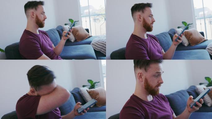 一名年轻男子在家使用手机时打喷嚏的4k视频片段
