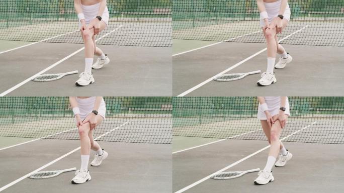 4k视频画面，一位面目全非的女子在打网球时伸腿