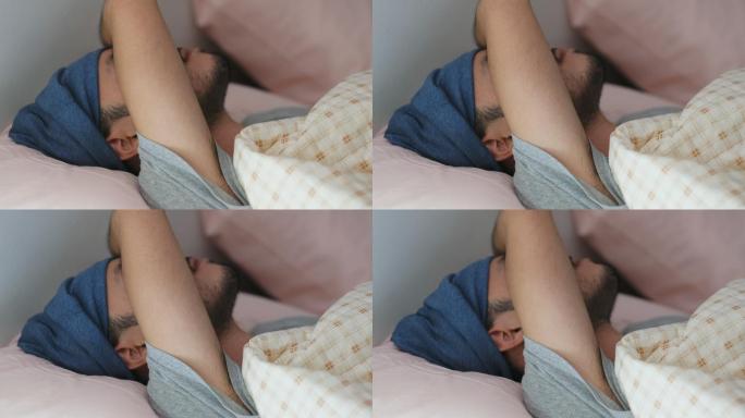 亚洲年轻男子卧床深度睡眠的特写镜头
