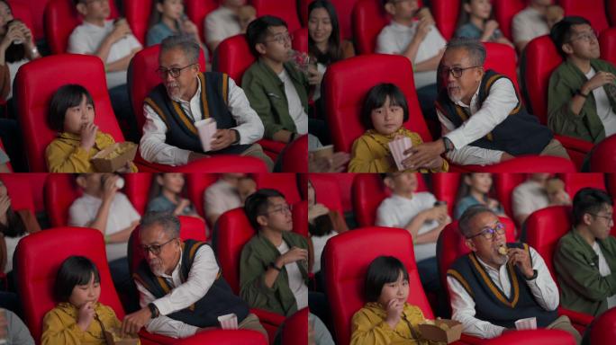 亚裔华人活跃老人和他的孙子们喜欢在电影院看电影