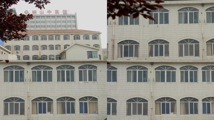徐州铜山中医院外景带树叶前景病房外景窗外