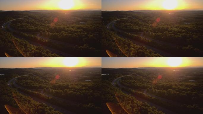 日落时分，在新泽西州I-80高速公路上，借助强烈的动态镜头光斑，在阳光下拍摄全景广角视图。具有平移摄