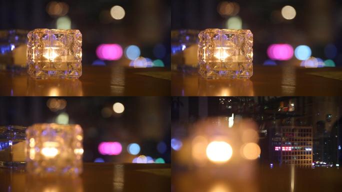 餐厅吧台环境钻石玻璃杯中的蜡烛光闪闪发亮