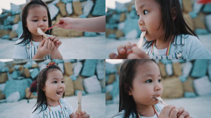 吃冰淇淋的可爱亚洲女孩
