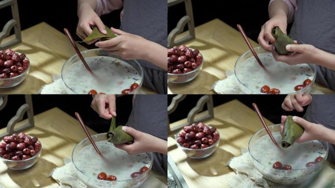 升格端午节手工包制粽子的儿童手部特写镜头