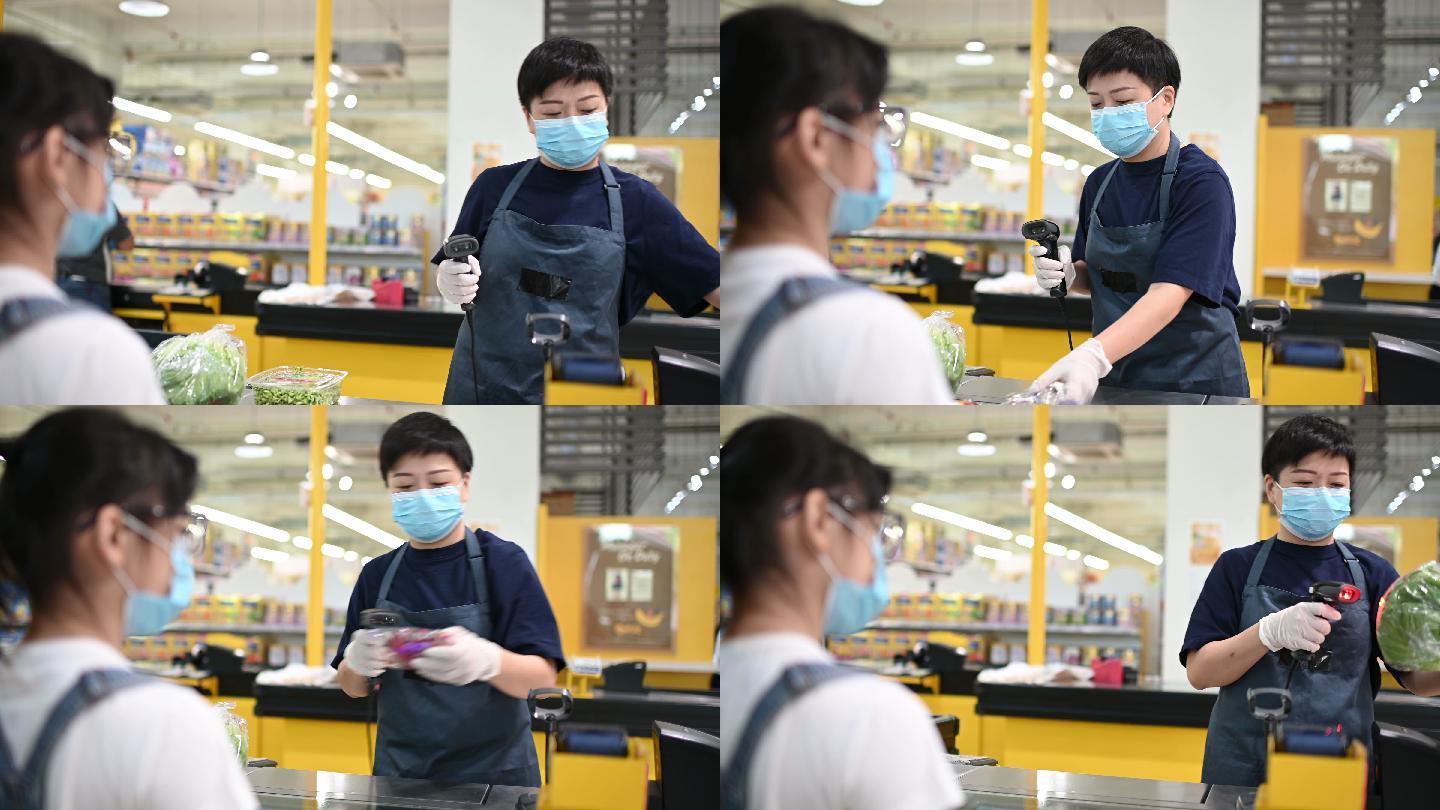 一位亚裔中国女性超市零售商售货员在柜台结账时扫描蔬菜的价格
