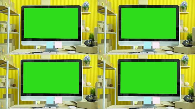 绿色屏幕背景的计算机显示器