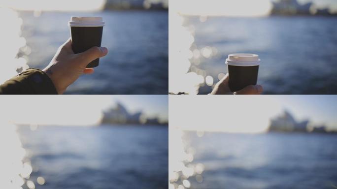悉尼港POV手持咖啡杯