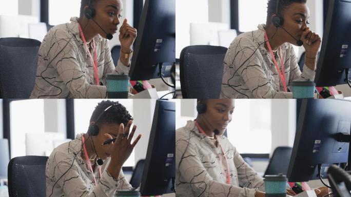 沮丧的女商人戴着耳机在办公室的电脑前工作