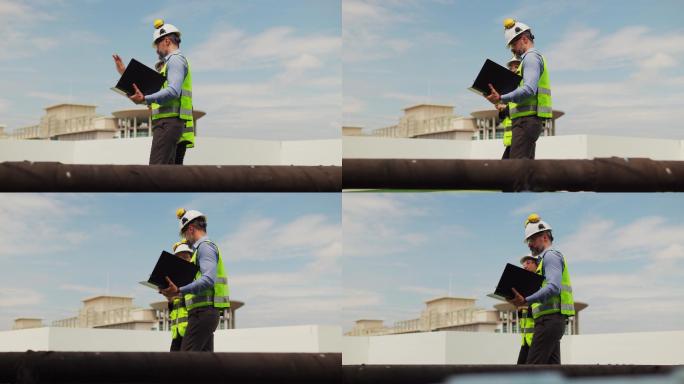 男性专家检查维护通风机的运行，维护建筑物内的空调系统