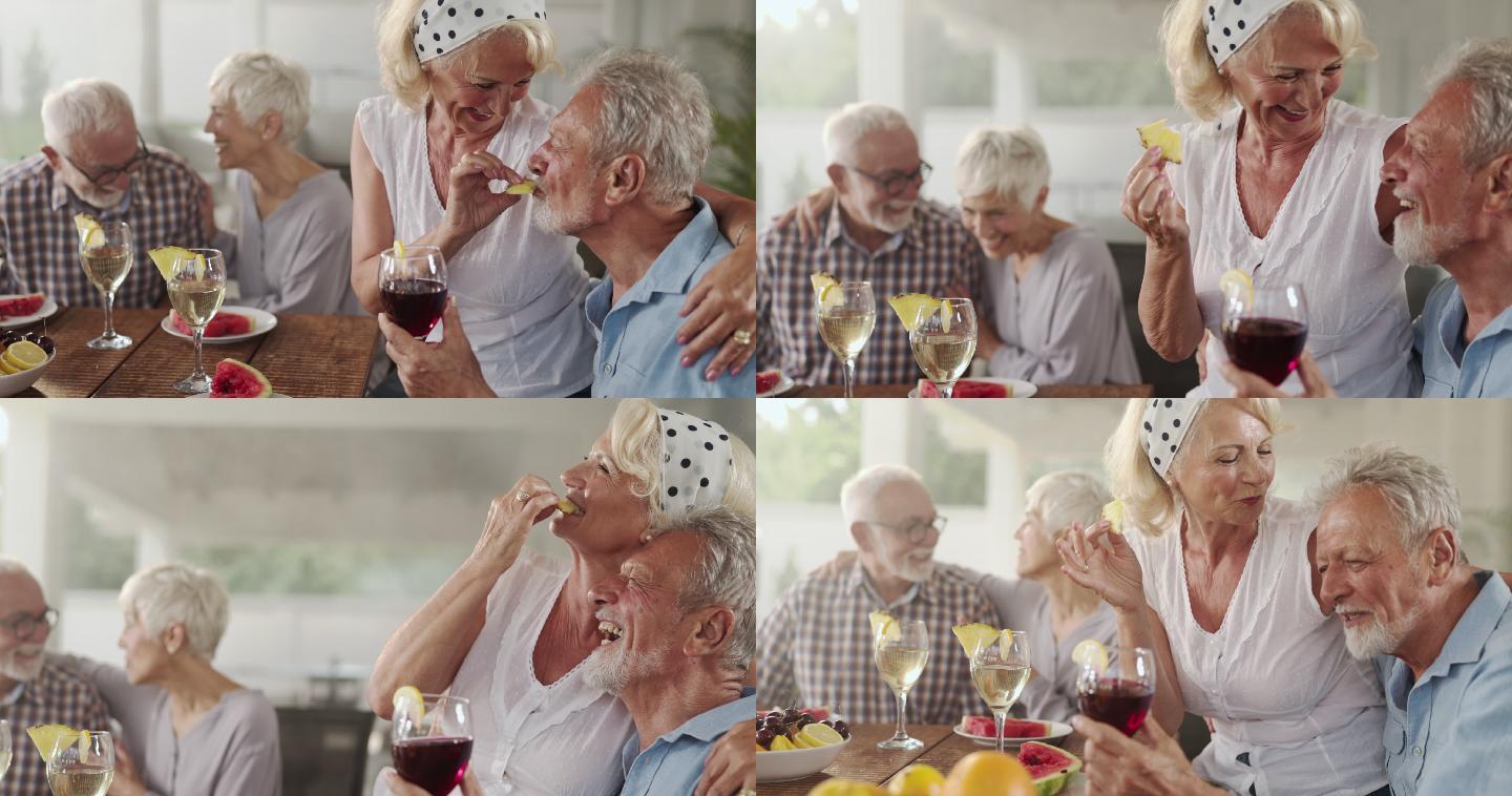 老年夫妇在院子里吃水果