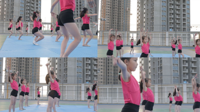 一群小女孩在操场练习舞蹈动作_60帧