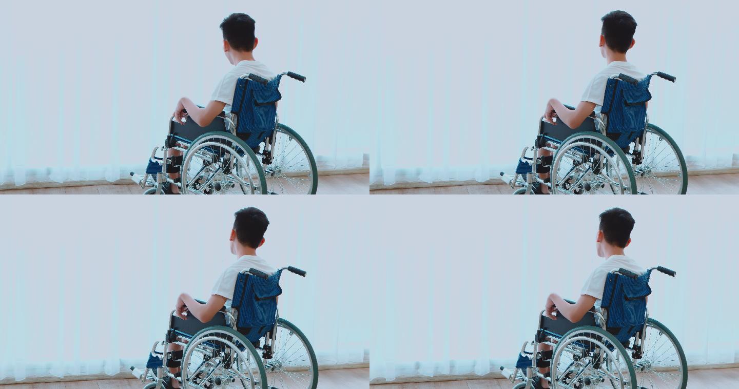 医院里的残疾男孩轮椅上的青年视频素材孤独
