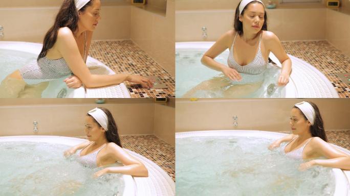 美女在浴缸里放松泡温泉