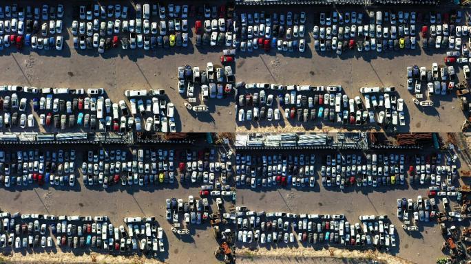 4k无人机拍摄的停放在废料场的汽车镜头