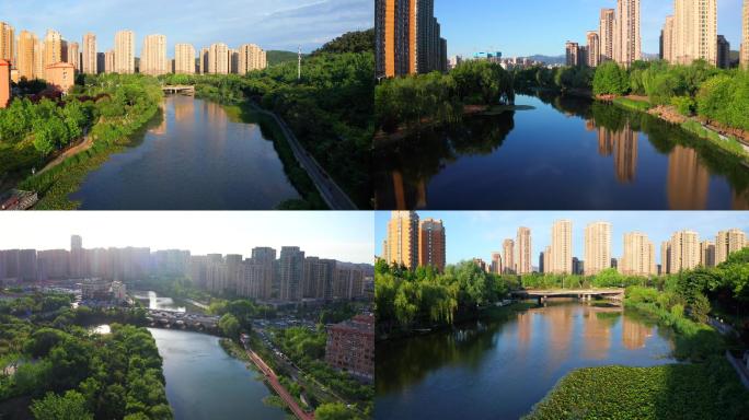 航拍城市河流和两侧楼房住宅宜居城市环境
