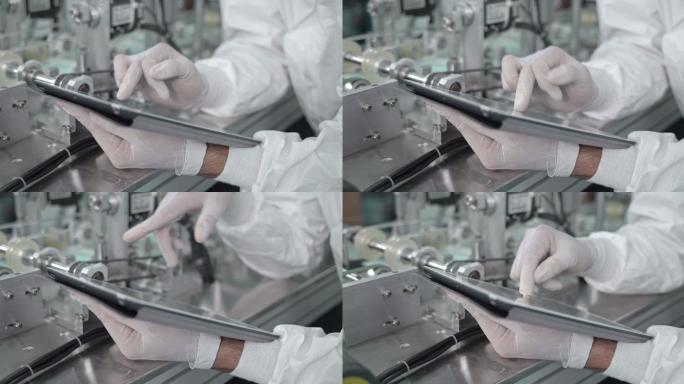 在工厂使用数字平板电脑控制手工工人的质量