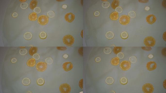 橙皮和柠檬皮在浴缸上的Slo运动