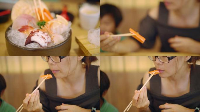 在日本餐厅吃日本菜的女人