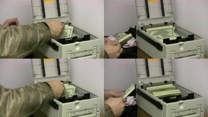 将现金装入ATM机。信用卡银行业