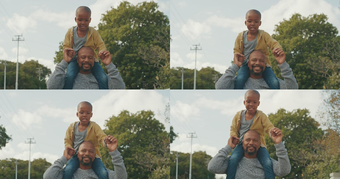 4k视频画面，一个英俊的成熟男子肩上扛着他的儿子在外面