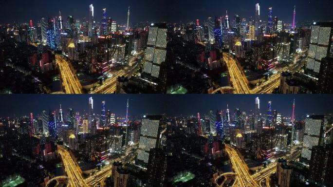 夜间城市摩天大楼的缩小视图