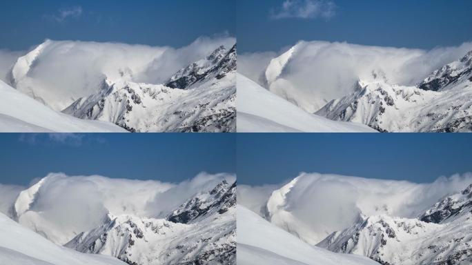 云层在雪山、高山景观上移动的时间推移