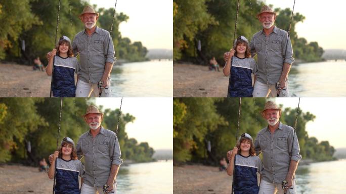 骄傲的祖父在河边钓鱼时拥抱着他的孙子