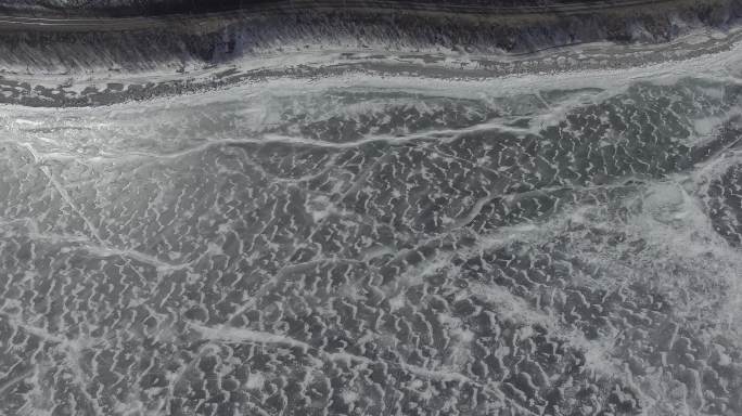 鸟瞰冰封的贝加尔湖至远山-4K航拍素材