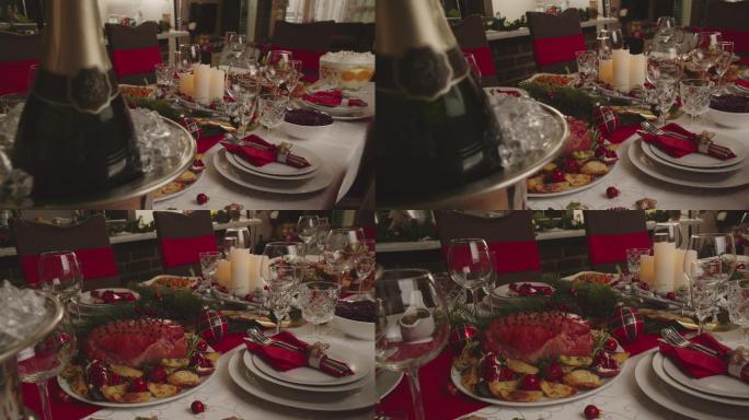圣诞晚餐，配上釉假日火腿、丁香、蔬菜、肉馅饼和蛋酒橘子馅饼