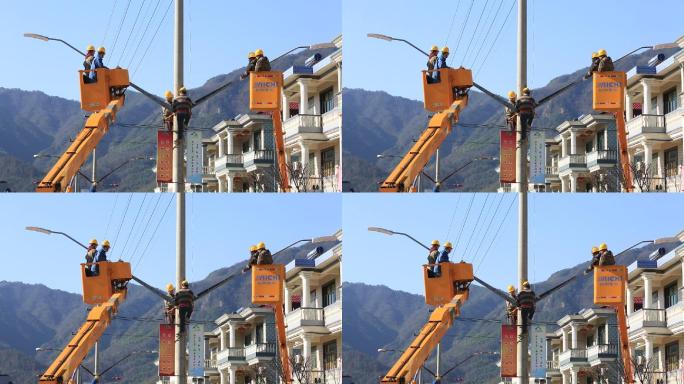 电力工人登高车高空作业农村电网改造抢修